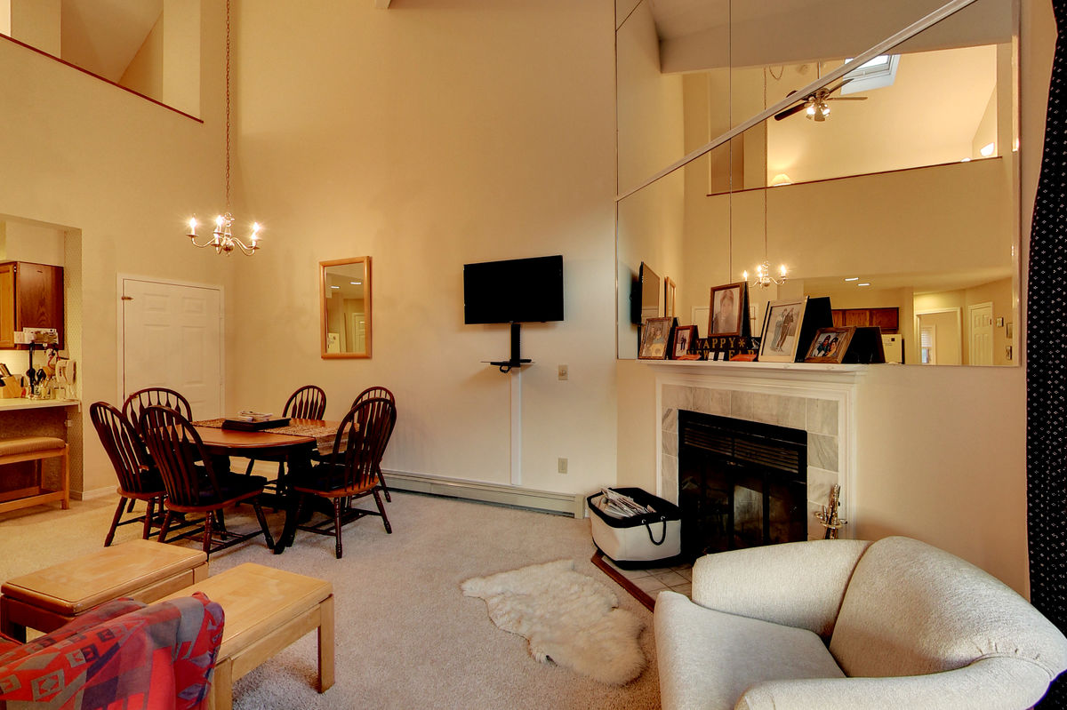 The Living Room with Fireplace in One of our Apartments in Killington, VT