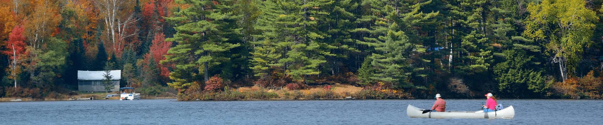 Picture of Two People Kayaking Outside Our Vermont Waterfront Rentals.